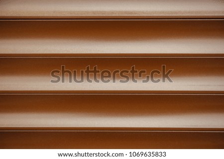 Metallic brown blinds. Abstract background pattern lines