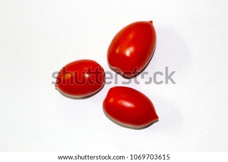 Stock images of fresh red tomatoes on a plain white background