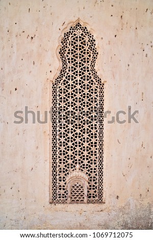 Indian Jali - A jali or jaali is the term for a perforated stone or latticed screen, usually with an ornamental pattern constructed through the use of calligraphy and geometry. 