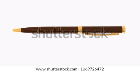 Brown pen with golden details on white background