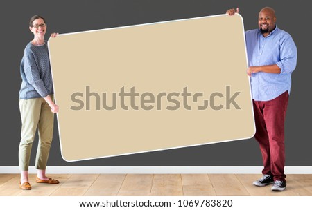 People holding a blank board