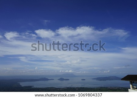 Landscape of the green mountain  sea and blue sky in summer time. Lovely Landscape Picture of the famous travel location of  TAGAYTAY Philippines.  Landscape nature background