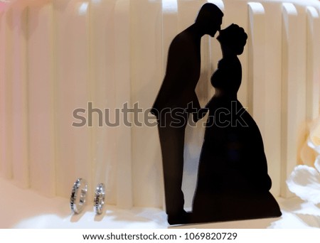 bride and groom silhouettes card display