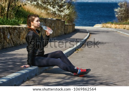 Young athletic girl in the Park