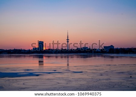 view of beautiful sunset and panorama picture of Hamburg tv tower