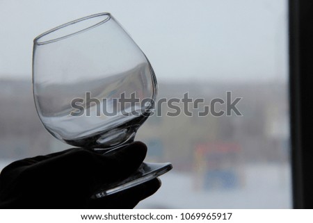 Cognac glass in hand