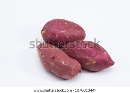 Sweet potatoes isolated on white