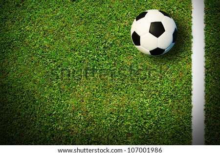 Soccer football field stadium grass line ball background texture light shadow on the grass