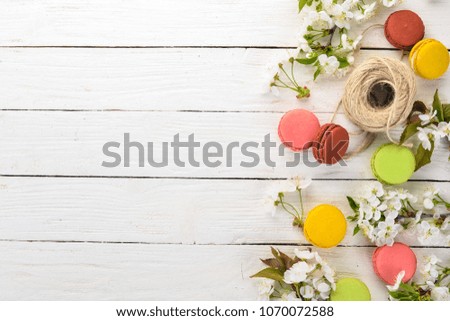 Macaroons colorful. Cake. Top view On a wooden background, Copy space.