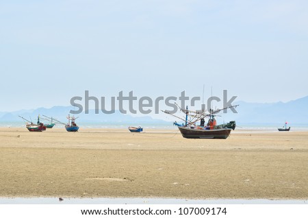 Small fishing boats, Many were stranded beach.