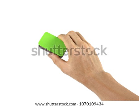 Hand holding brush erase isolated on white background with clipping path.Concept education and school.