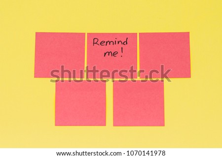 Mock-up colored red empty office stickers on a yellow background, note reminder sticker on a wall, close up, remind me! Planning, management, employment, business, reminder and people concept