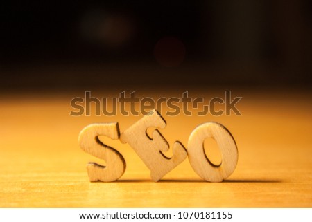 The word seo written with wooden letters background