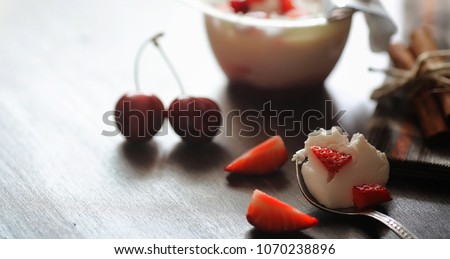 Fresh yogurt with berries. Ice cream in a bowl