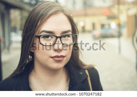 Portrait of girl with glasses