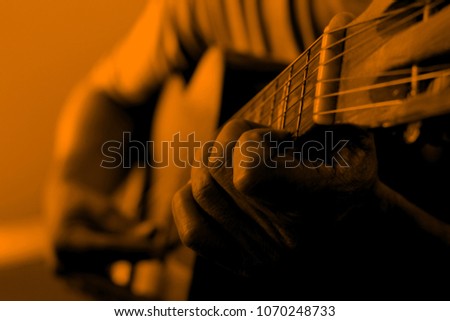 
A man and a guitar