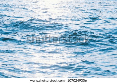 Water blue wave on the ocean.Movement of the water wave in the sea.