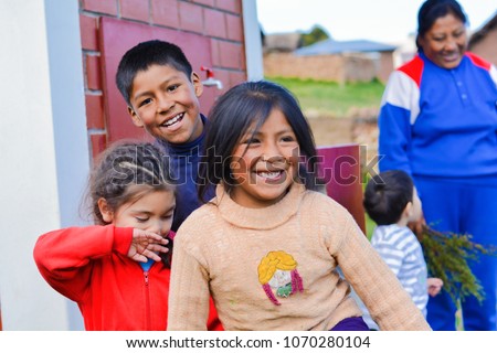 Playful native american children in the countryside. Royalty-Free Stock Photo #1070280104