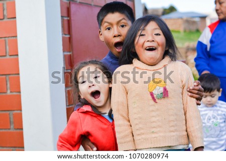 Funny native american children with opened mouth. Royalty-Free Stock Photo #1070280974