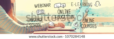 Online Education with woman working on a laptop in brightly lit room