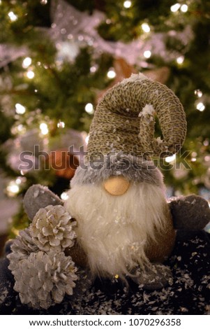 close up of Christmas decoration, photographed in front of a Christmas tree ,with a bokeh effect. 