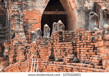 Wat Chaiwatthanaram Landmark of Ayuuthaya ,Thailand. Ruin of Buddha's statue  