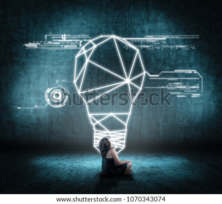 Girl looking up to a digital lightbulb with data.