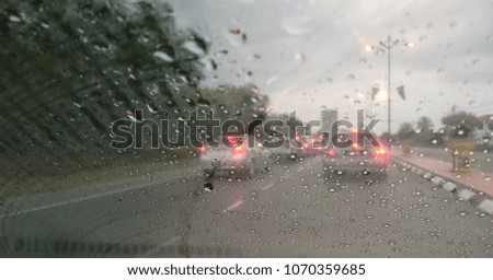 blurry background wallpaper with raindrop on windows in raining day