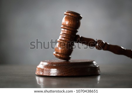 Judge's gavel in courtroom