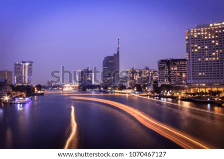 Beautiful night light Chao Phraya river cityscape in Bangkok ,Thailand.