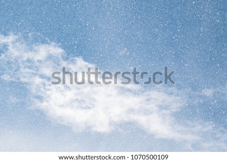 snowflakes on blue sky background