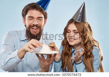   happy young couple celebrating a birthday                             