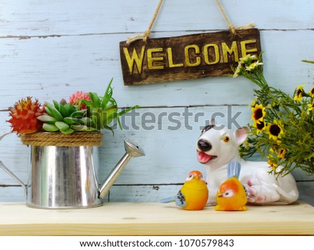 welcome sign and home decor with space copy background