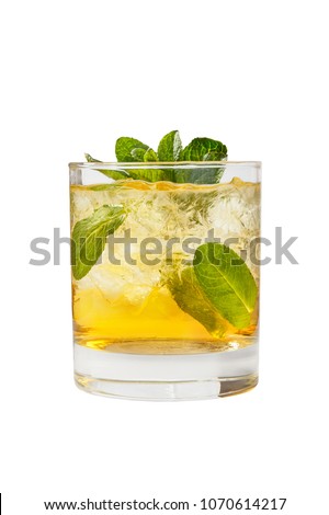 Transparent one-color cocktail in a low glass with crushed ice frappe with mint leaves with melon, pear, apple taste. Side view Isolated white background. Drink for the menu restaurant, bar, cafe Royalty-Free Stock Photo #1070614217