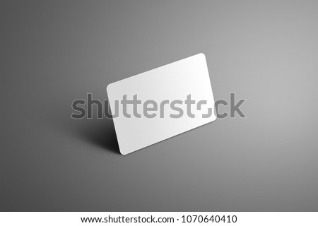 Realistic white mockup one  bank (gift) card with shadows on a gray background. Ready to used in your design.