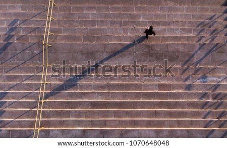 Man on the stairs, aerial photography, picture with drones
