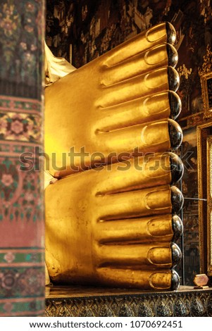 Picture of the golden reclining Buddha statue at the Wat Pho Temple, Bangkok, Thailand