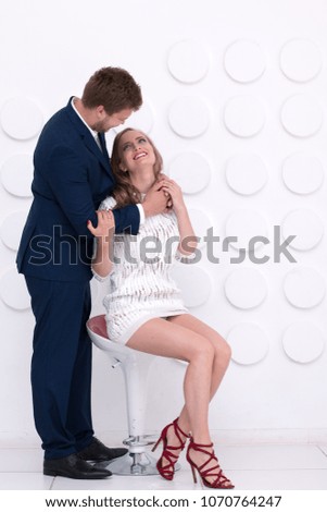 a girl and a guy, couple, hug, pictures in the Studio