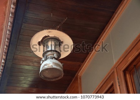 Vintage camping lantern hang on the ceiling