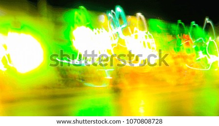 blurred lights in motion on a black background