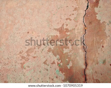 Texture of old cracked concrete floor with stains background.