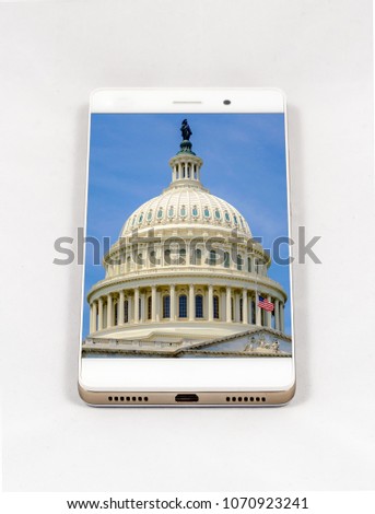 Modern smartphone with full screen picture of United States Capitol building, iconic home of the United States Congress, Washington DC, USA. Concept for travel smartphone photography