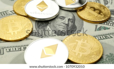 Ethereum ETH coins and Bitcoin BTC coin rotating on bills of 100 dollars