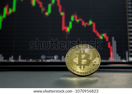 Golden bitcoin and stock chart background. 