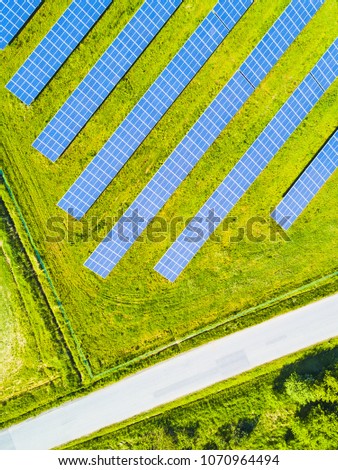 Aerial view of solar panels. Renewable solar energy theme for background. Solar power station from drone view.