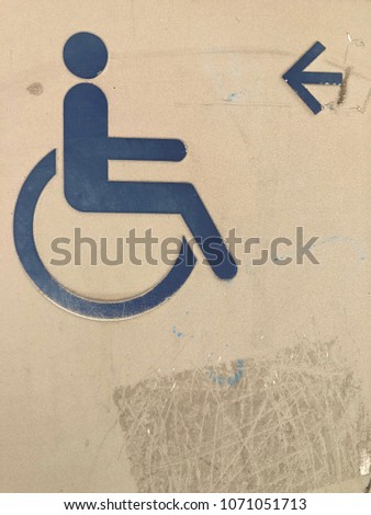 Handicap sign with arrow