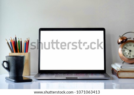 Mock up laptop blank screen desktop. workspace of designer 