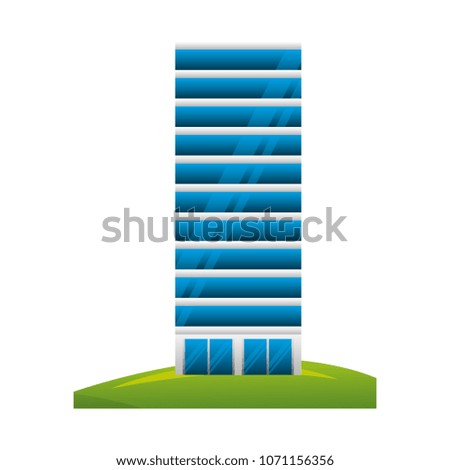 big building structure with grass