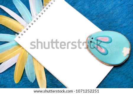 Open notepad blank page on a blue background            