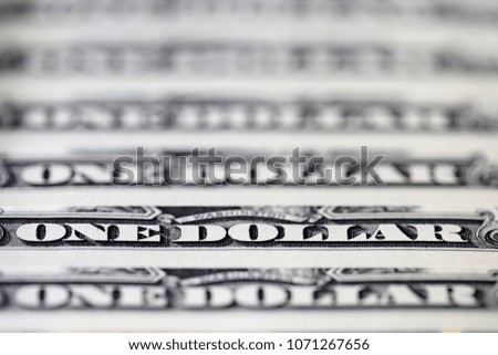 Close up of US one dollar bills. One dollar banknotes background
